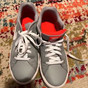 Woman's nike 10.5 grey and orange sneakers